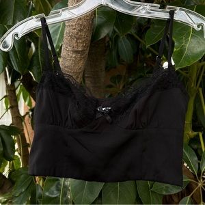 Princess Polly black crop top with lace detailing with a zipper on the side.